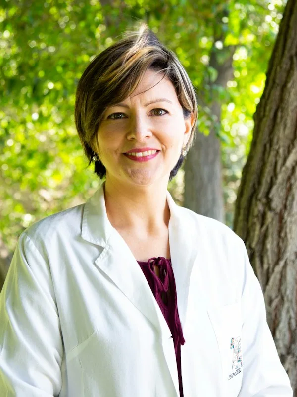 Dr. Elena R.
